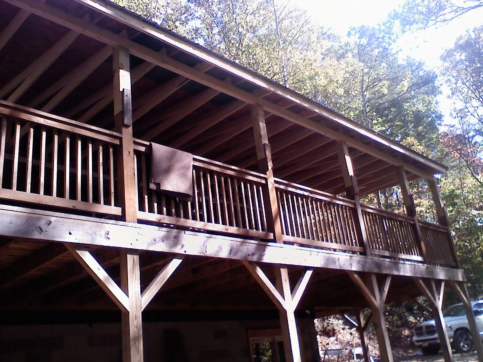 Timber framing under a new elevated porch and deck — Roof Leak Repair in Beavertown by Roofing Brothers